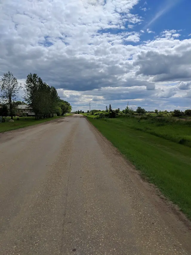 Gravel road at the edge of town
